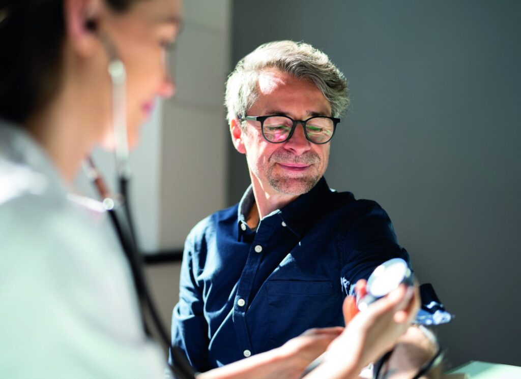 Doctor measuring a patient's blood pressure