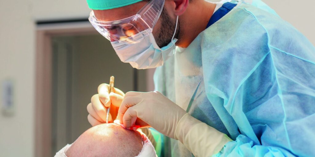 Surgeon performing a hair transplant procedure
