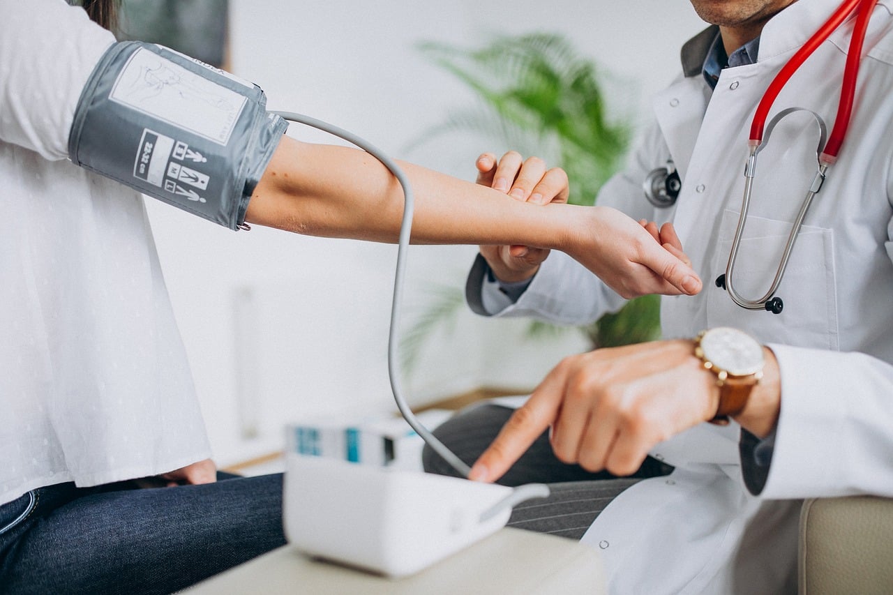 Doctor measuring a patient's blood pressure