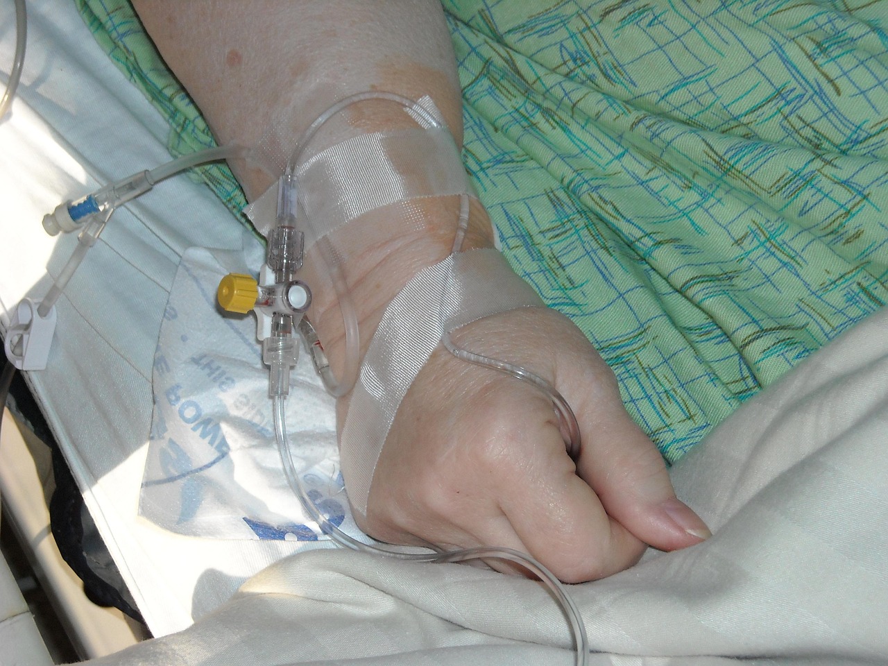 Woman relaxing during an IV infusion