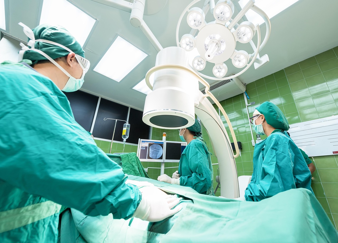 Neurosurgeon operating with a surgical microscope