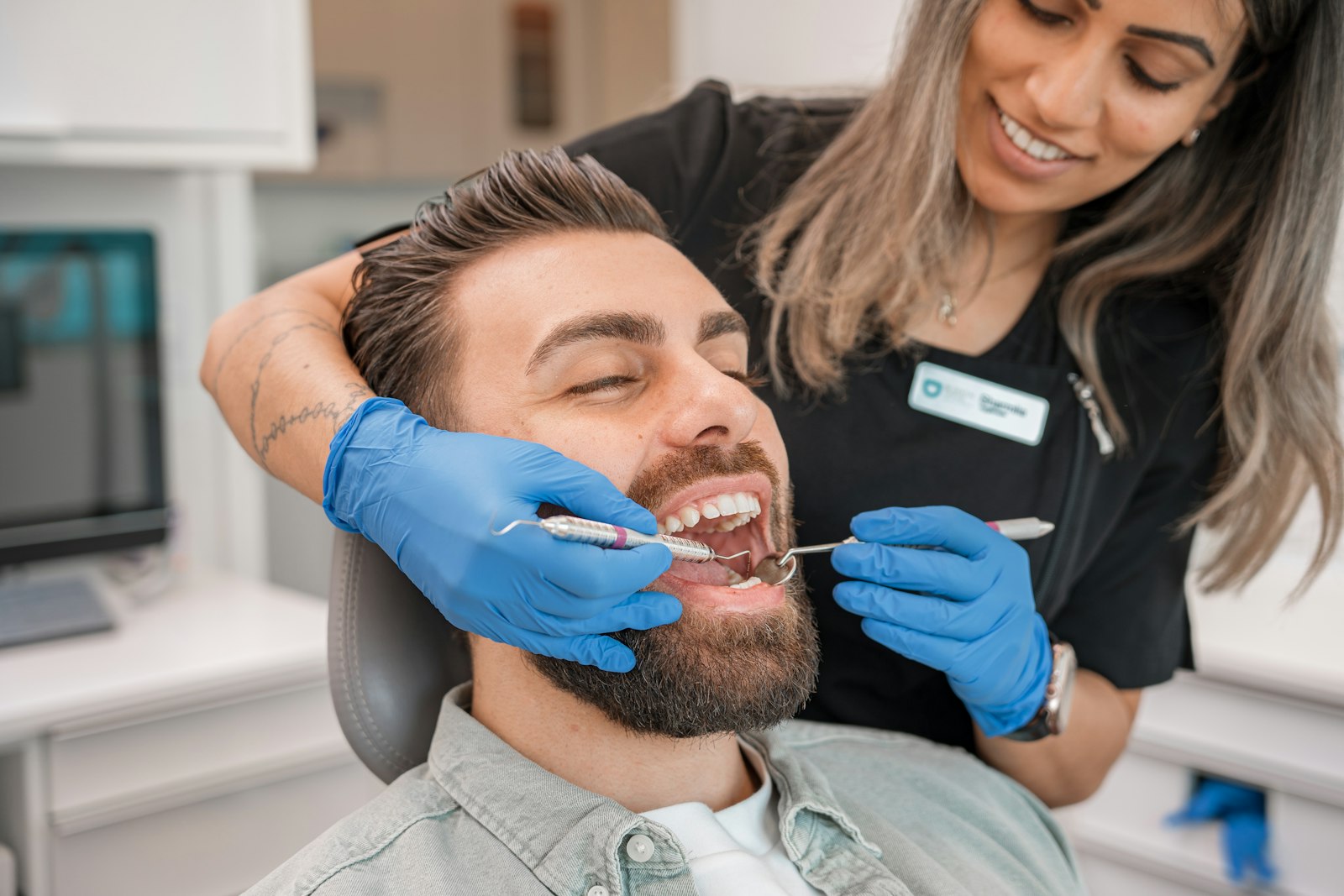 Dentist examining a patient’s teeth
