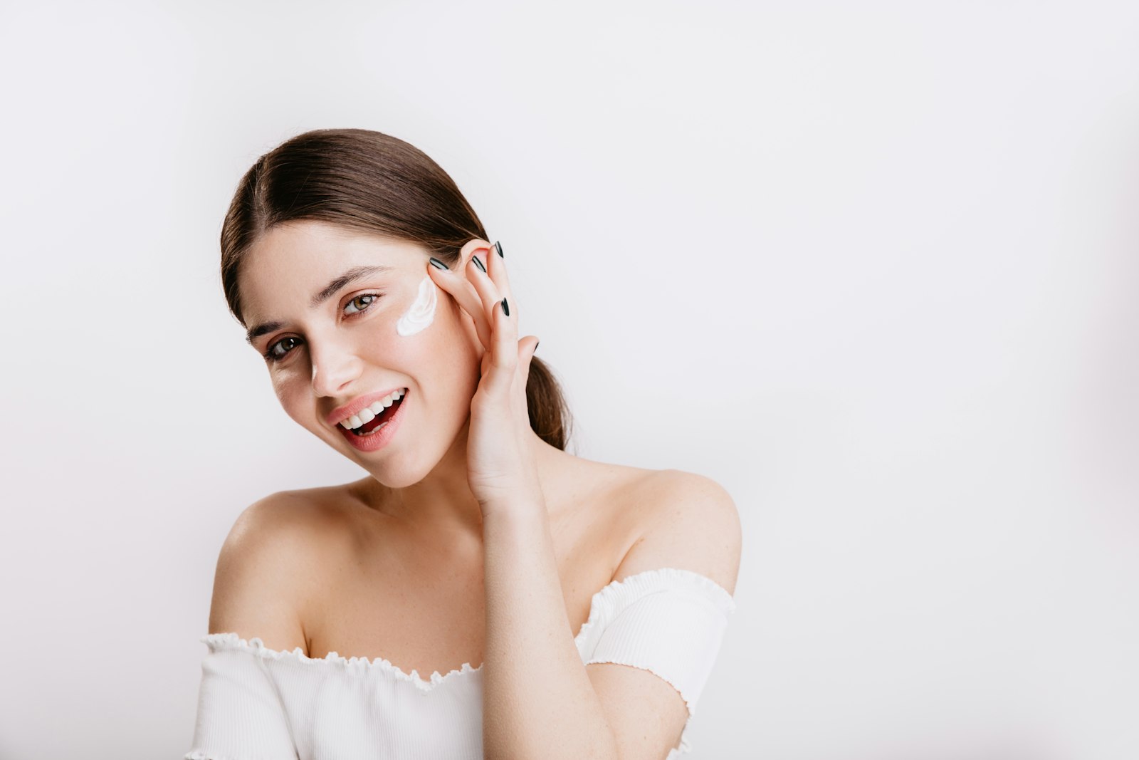 Woman touching her jawline