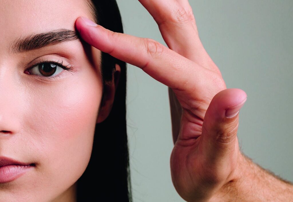 Eyelid area examined for blepharoplasty